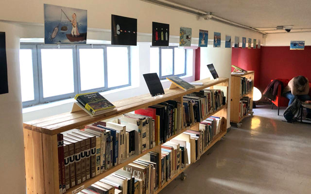 The French Institute of Jordan is providing an exhibit space in its mezzanine-level library for the Jordanian Cartoonist Association to use cartoons to draw attention to the Kingdom’s environmental issues (Photo by Sean Matthews)