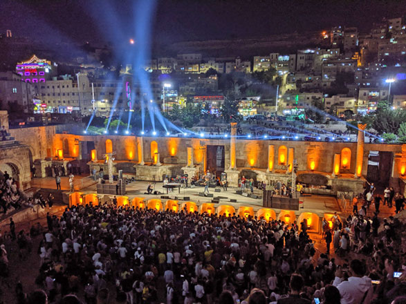 Jordanian singer and pianist Aziz Maraka plays a double concert with the Lebanese band Adonis at the Roman Theatre in Amman on Friday (Photo by Ala Jamal Zahrawi)