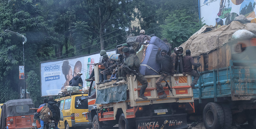  Armed Forces of the Democratic Republic of the Congo soldiers are seen sitting on top of a truck driving in the streets of Bukavu on Friday (AFP photo)