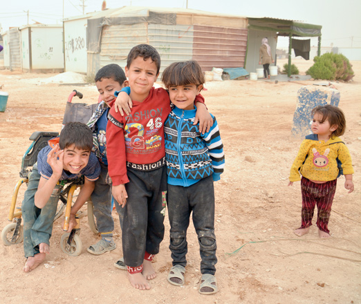 Syrian children pose for a photo at Zaatari refugee camp near Mafraq in this photo taken on November 13, 2017  (Photo by Amjad Ghsoun)