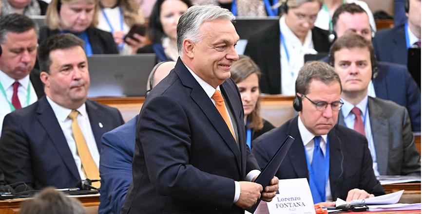 Hungarian Prime Minister Viktor Orban stands to deliver his opening speech prior to the Conference of Speakers of the European Union Parliaments at the parliament in Budapest on Tuesday (AFP photo)