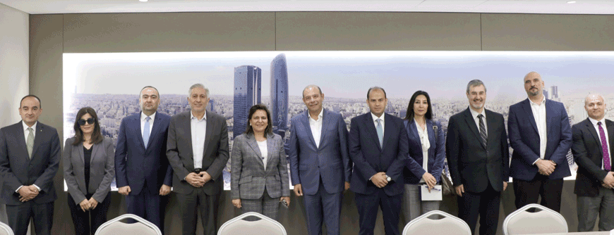 Minister of Investment Khuloud Saqqaf poses for a group photo during a tour of the Abdali project on Monday (Petra photo)