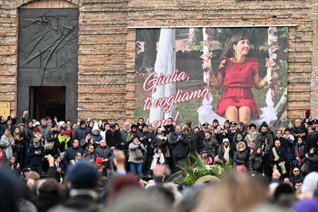 People attend the funeral of Giulia Cecchettin, a university student killed by her ex-boyfriend, one of the country's most recent and shocking episodes of femicide, in Padova on December 5, 2023 (AFP photo)