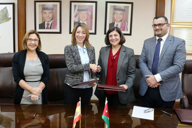 Minister of Planning and International Cooperation Mary Kawar and Spanish Secretary of State for Trade Xiana Mendez (second from left) sign a memorandum of understanding, on Wednesday (Photo courtesy of the Planning Ministry)