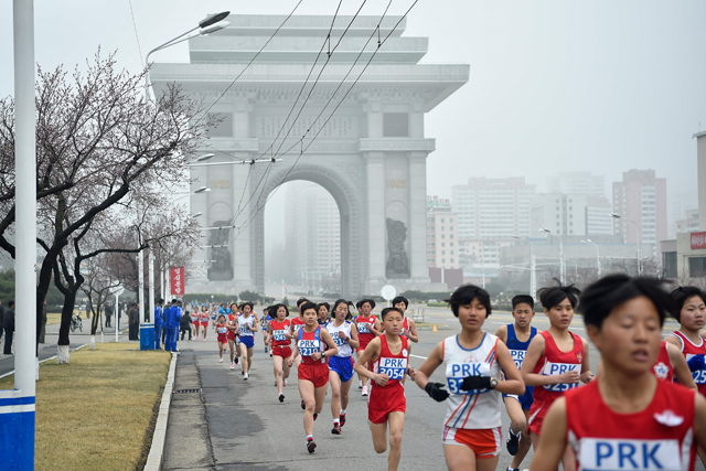 Participants take part in the 31st Pyongyang International Marathon in Pyongyang on Sunday  (AFP photo)