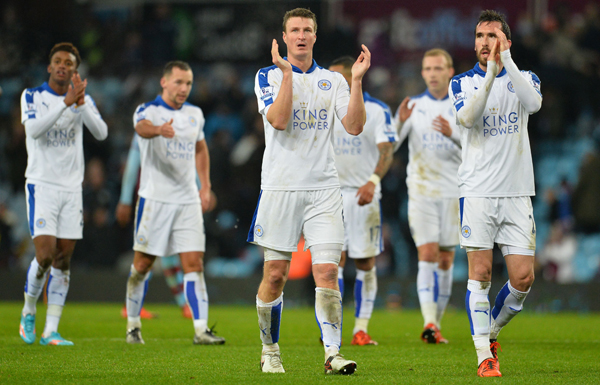 Leicester City players appluad the fans as they leave the pitch following the English Premier League football match between Aston Villa and Leicester City at Villa Park in Birmingham, on Saturday  (AFP photo)