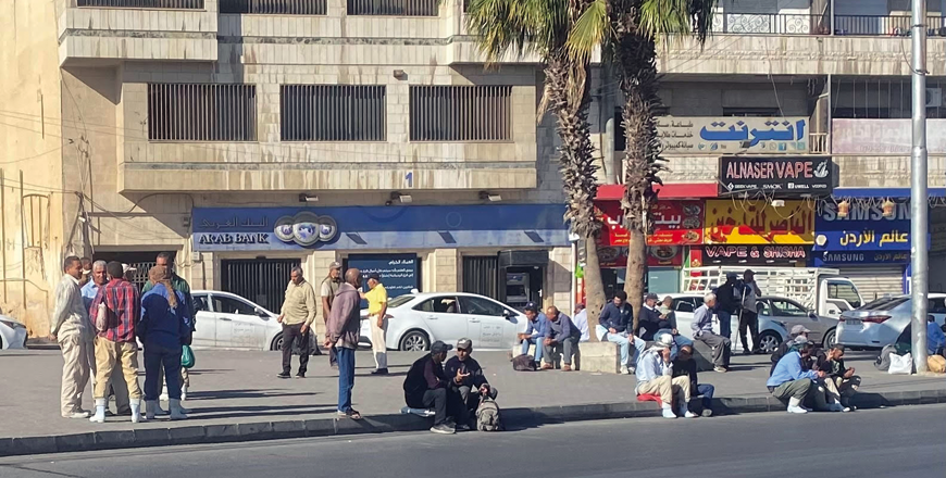 Day labourers wait for employers in Amman in this recent photo  (Photo by Mays Ibrahim Mustafa)