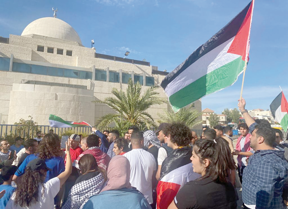 Protesters are seen near the Israeli embassy in Amman, voicing their solidarity with Palestinian resistance amid the ongoing 'Al Aqsa Flood' operation on Saturday (Photo by Mays Ibrahim Mustafa)