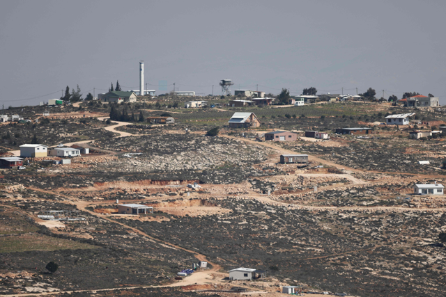 A photo taken from the Palestinian village of Aqraba shows the Israeli settlement outpost of Gevat Arnon, near Nablus city in the southern occupied West Bank, on Tuesday (AFP photo)