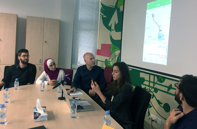 The Maan Nasel group launches a mobile application that maps out routes for users of public transport in Amman during a press conference on Monday (Photo by Suzanna Goussous)
