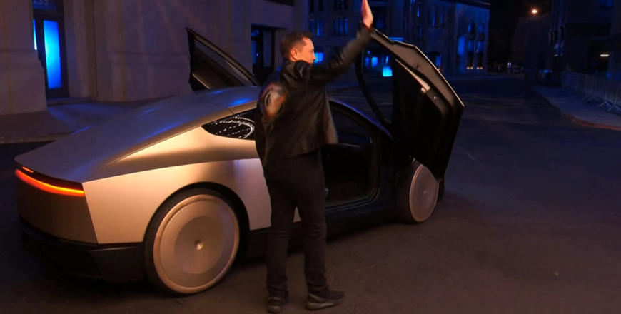 Video grab obtained on Thursday shows Tesla CEO Elon Musk waving next to his long-promised robotaxi during a launch event at the Warner Brothers studio lot near Los Angeles (AFP photo)