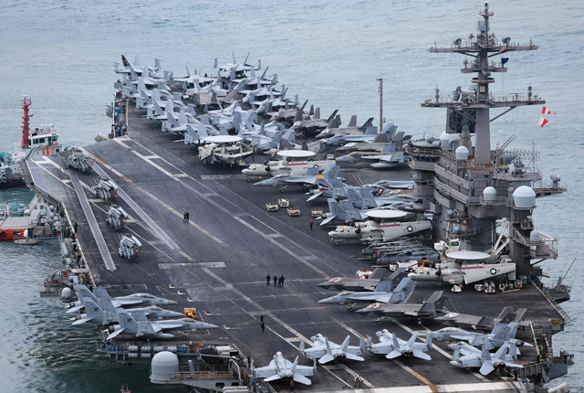 The USS Carl Vinson, a US nuclear-powered aircraft carrier, arrives at a South Korean naval base during its port visit in the southeastern port city of Busan on Sunday (AFP photo)
