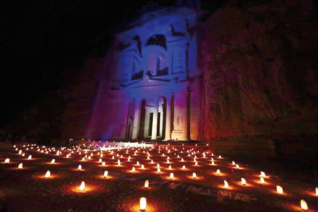 Petra’s ancient Treasury, the rose-red city’s iconic façade, is seen lit up in blue to mark World Cancer Day on Friday (Petra photo)