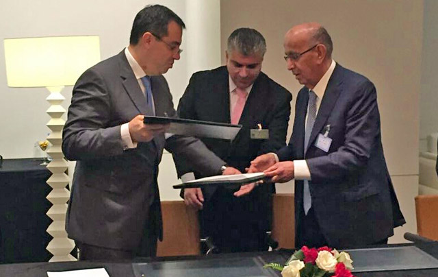 Planning Minsiter Imad Fakhoury and AFESD Chairman Abdullatif Youssef Al Hamad sign a cooperation agreement in Rabat, Morocco  (Photo courtesy of Ministry of Planning and International Cooperation)