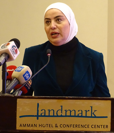 Minister of Social Development Wafa Bani Mustafa speaks at a local conference to boost women’s participation in the private sector on Monday (Petra photo)