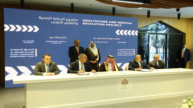 Prime Minister Bisher Al Khasawneh attends the signing ceremony of an investment and development agreement between the Jordan Investment Fund and the Saudi Jordanian Investment Fund to implement a project worth $400 million in the healthcare and medical education sectors on Monday (Photo courtesy of Prime Ministry)