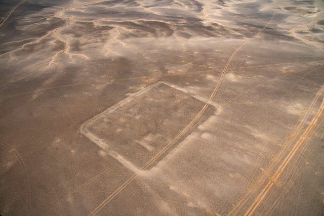 Oblique aerial landscape view of the central camp, from the east (Photo courtesy of APAAME/B. Bewley)