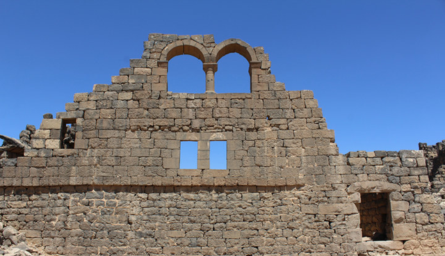 The East facade of House XVIII, consolidation masonry to the left of double window (Photo courtesy of ACOR)