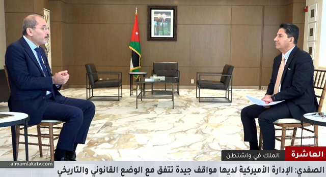 In this image grab taken from Al Mamlaka TV on Tuesday shows Deputy Prime Minister and Foreign Minister Ayman Safadi speaking during an interview