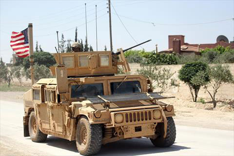 In this file photo, the US flag flutters on a military vehicle in the Manbej countryside, Syria, on May 12, 2018 (Reuters photo)