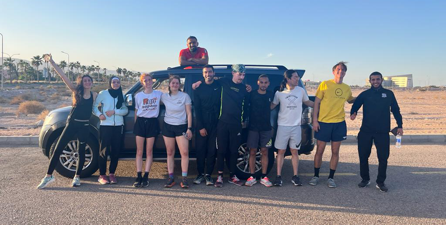 Photo courtesy of Oscar Stapleton The running camp participants pose together after a running session for a photo taken in Aqaba this April 