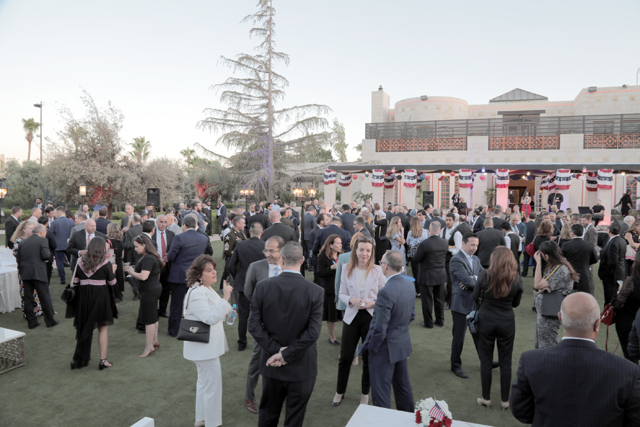 Guests during an official reception hosted by US Ambassador to Jordan Henry T. Wooster at his residence on Wednesday in recognition of the US Independence Day (Photo courtesy of US embassy)