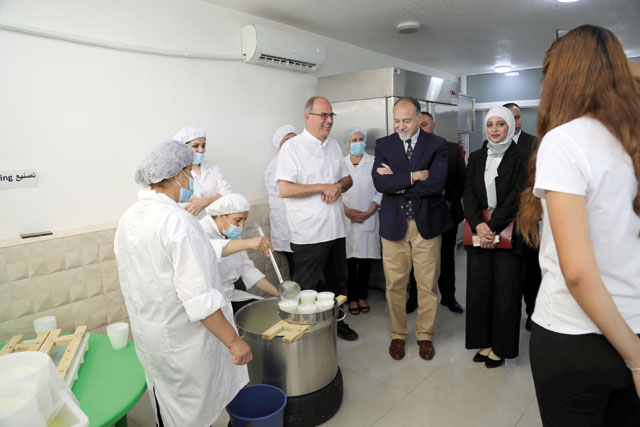 US Ambassador Henry T. Wooster visits a dairy factory supported by USAID in Karak’s Ader village on Wednesday (Photo courtesy of US embassy)