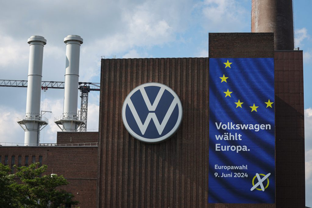 The lettering Volkswagen chooses Europe. Europe votes on 9 June 2024 is seen on the wall of the power plant at the headquarters of German car maker Volkswagen (VW) in Wolfsburg on May 23, 2024  (AFP file photo) 