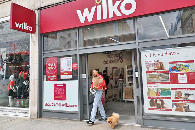 A shopper leaves a branch of 'Wilko' in west London on August 3 (AFP file photo)