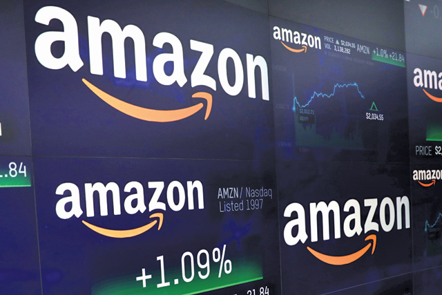The Amazon.com logo and stock price information is seen on screens at the Nasdaq Market Site in New York City, New York, US, on Tuesday (Reuters photo)