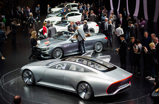  This photo taken on September 16, 2015 shows visitors at the Mercedes Benz hall at the 66th IAA auto show in Frankfurt am Main, western Germany (AFP file photo])