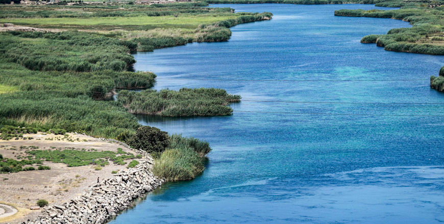 This photo taken on July 26, 2021, shows a view of the Euphrates River near the 1973 Tabqa Dam (unseen) in Raqqa province in eastern Syria  (AFP photo)