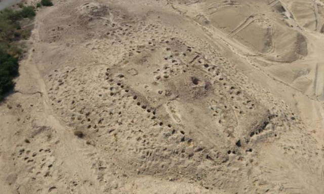  Holes dug by looters are seen in this photo taken at Fifa in Jordan (Photo courtesy of the Follow the Pots Project)
