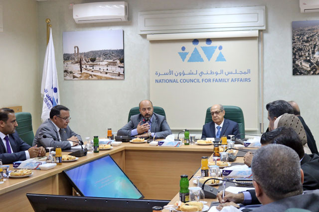 National Council for Family Affairs Secretary General Mohammad Miqdadi (third from left) and Arab Council for Childhood and Development Secretary General Hasan Bilawi (fourth from left) during a meeting on Wednesday (Photo courtesy of NCFA)