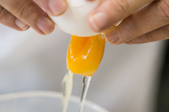 An employee of the chemical veterinary examination office tests eggs for contamination by the insecticide fipronil in Krefeld, western Germany, on Monday (AFP photo)