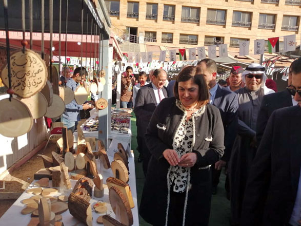Planning Minister Mary Kawar tours an exhibition showcasing products made by beneficiaries of the ministry’s IRADA programme  (Photo courtesy of the Planning Ministry)