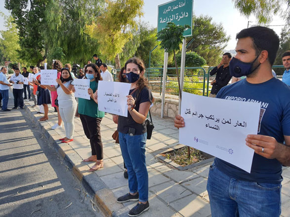 Citizens stage a sit-in near the Prime Ministry building in Amman to protest against the alleged killing of a Jordanian woman by her father for reasons related to 'family honour' on Monday (Photo by Rana Husseini)