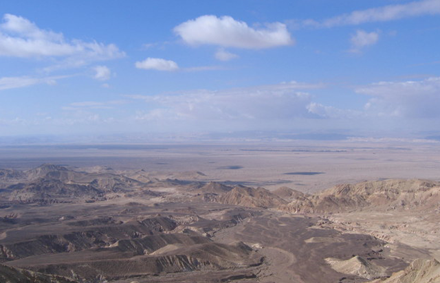 Arid landscape of Wadi Feynan was known in ancient times  for its copper production (Photo courtesy of ACOR/ Barbara Porter Collection)