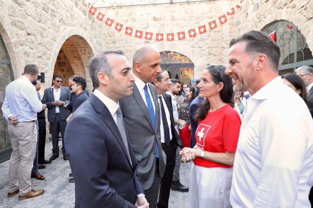 Switzerland’s Ambassador to Jordan Emilija Georgieva and guests during an event marking Switzerland’s 732nd ‘birthday’ in Amman on Tuesday (Photo by Osama Aqarbeh)