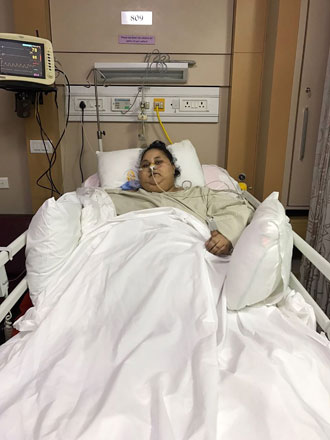 This handout photograph released by The Saifee Hospital on Thursday shows Egyptian patient Eman Ahmed Abd El Aty as she lies in a hospital bed at The Saifee Hospital in Mumbai on Wednesday after an operation  (AFP photo/Saifee Hospital)