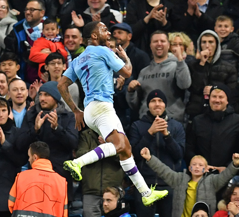 Manchester City’s English midfielder Raheem Sterling celebrates scoring their fifth goal to complete his hattrick during the UEFA Champions League Group C match against Atalanta in Manchester, England, on Tuesday (AFP photo by  Paul Ellis)