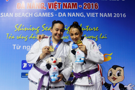 Jordan jiu jitsu fighters Rana (right) and Luma Qubbaj win gold medals on Monday at the Asian Beach Games in Da Nang, Vietnam (Photo courtesy of the JOC News Service)