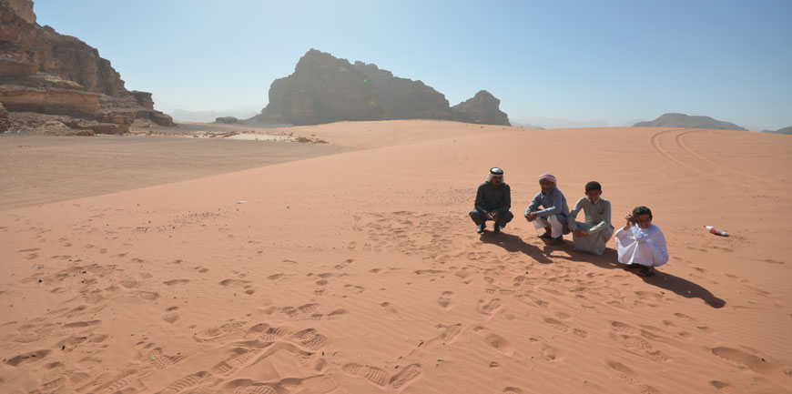 Hassan Maraaiah, Hussein Suweilheen, Jacir Eid and Yousef Suweilheen (Hussein's cousin) pose for a photo on Friday in Wadi Rum, where 'Theeb' was filmed  (Photo by Muath Freij)