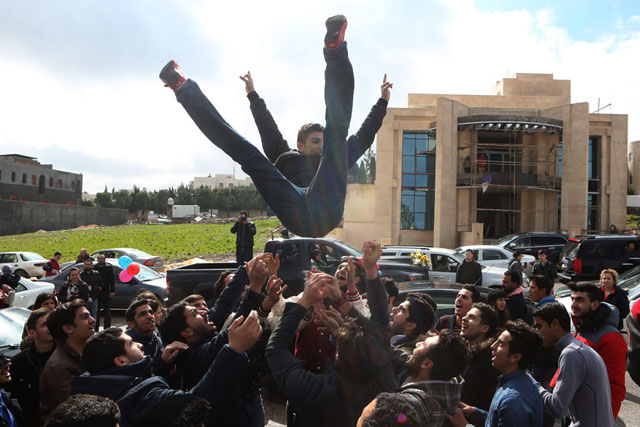 General Secondary Education Certificate Examination students celebrate their winter session results in Amman on Monday (Photo by Khaled Oudat)