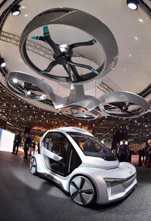 The ‘Pop.up next’ concept flying car, a hybrid vehicle that blends a self-driving car and passenger drone by Audi, Italdesign and Airbus is seen during the first press day of the Geneva International Motor Show on Tuesday in Geneva (AFP photo)