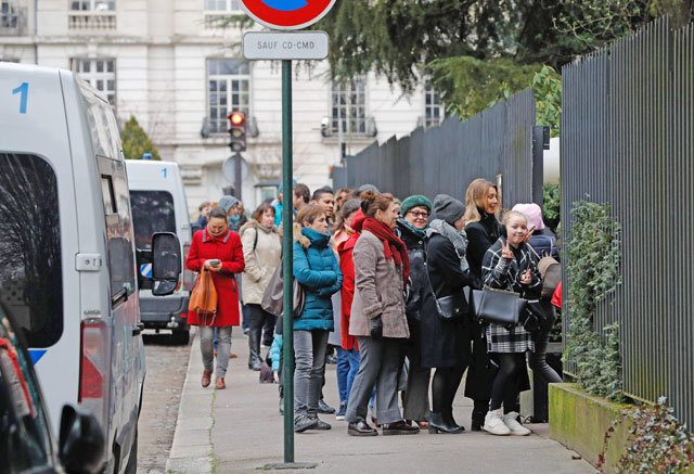 Russians queue to vote at the Russian embassy in Paris, on Sunday, during Russia’s presidential election (AFP photo)
