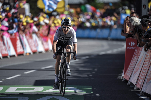 Great Britain's Geraint Thomas rides in the last metres on his way to cross the finish line and win the eleventh stage of the 105th edition of the Tour de France cycling race between Albertville and La Rosiere, French Alps, on Wednesday (AFP photo)