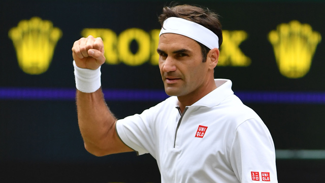 Switzerland’s Roger Federer celebrates beating France’s Lucas Pouille during their men’s singles third round match on the sixth day of the 2019 Wimbledon Championships at The All England Lawn Tennis Club in Wimbledon, southwest London, on Saturday (AFP photo by Glyn Kirk)