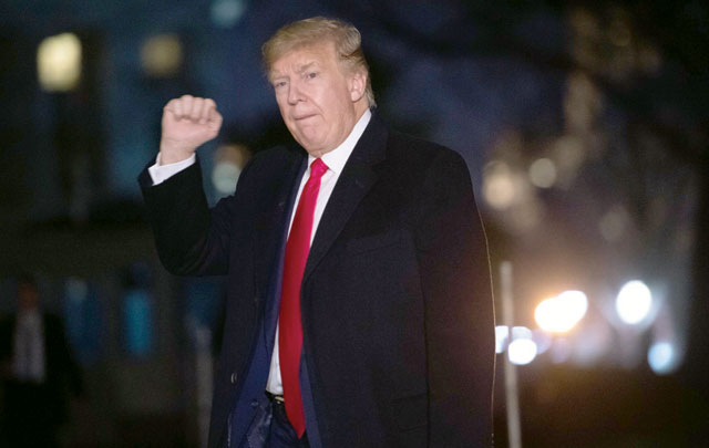US President Donald Trump walks from Marine One upon arrival on the South Lawn of the White House in Washington, DC, on Wednesday (AFP photo)