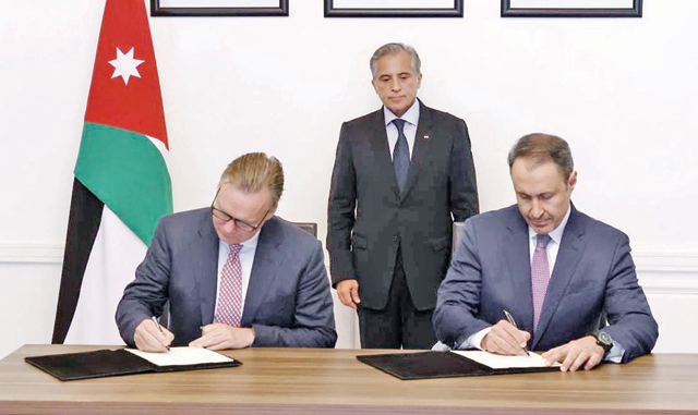 The Aqaba Development Corporation and APM Terminals sign an agreement on Wednesday to develop and manage the Aqaba Container Terminal with a total direct investment volume of $242 million (Petra photo)